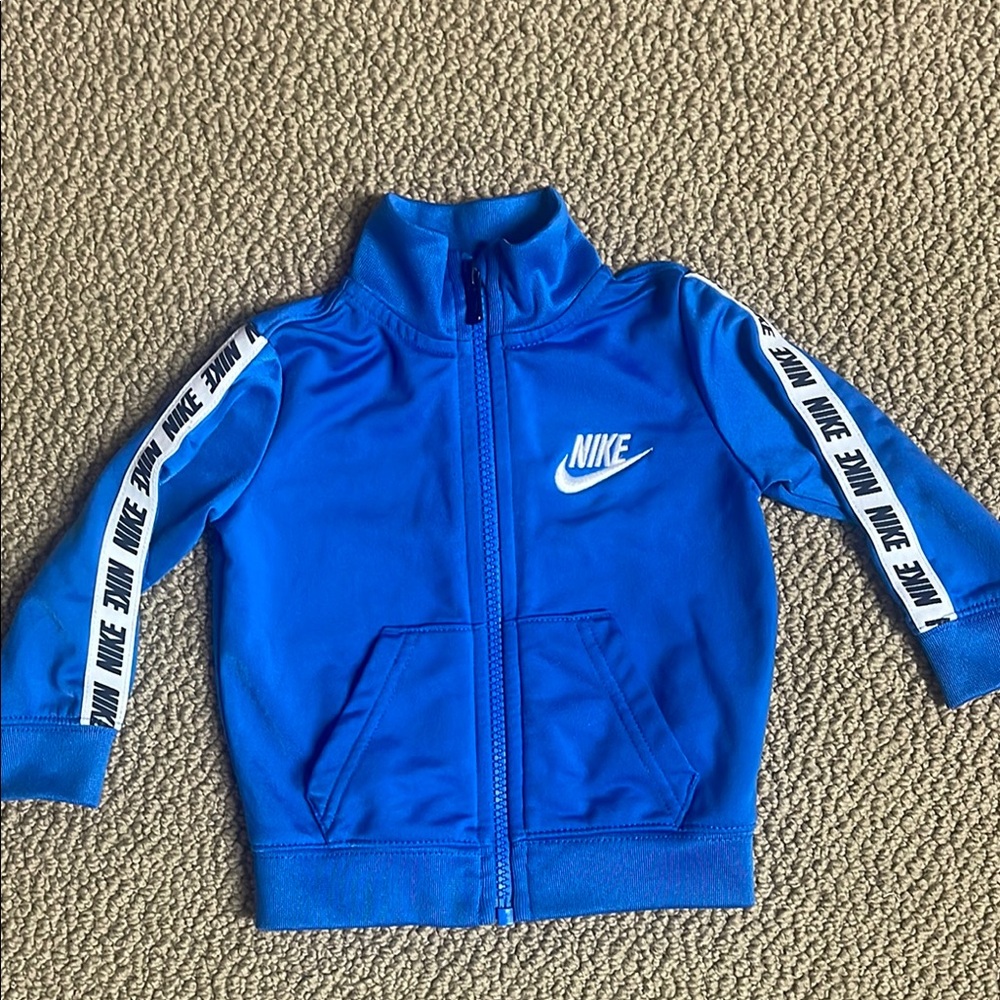Nike Blue jacket with High Collar and White Stripes